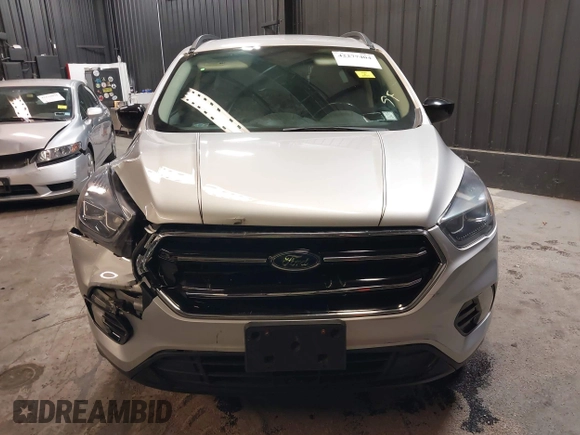 2018 Ford Escape SE z VIN 1FMCU9GD0JUD33111, wystawiony jako IAAI lot #42277404 z przebiegiem 71 896 mil mil oraz . Historia ofert i sprzedaży dostępna na DreamBid. Obrazek 12.