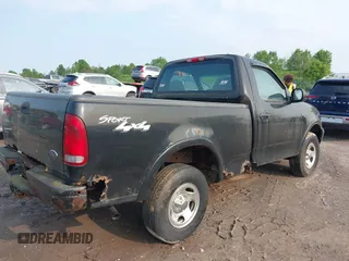 2003 Ford F-150 XL with VIN 2FTRF18243CB08751, listed as a IAAI auction lot 42456956 with 130,805 mi miles and . Bid and sale history available at DreamBid. Image 4.
