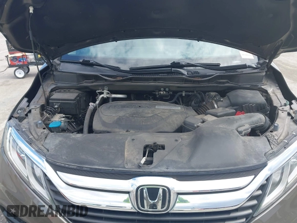 2018 Honda Odyssey EX-L z VIN 5FNRL6H76JB082421, wystawiony jako IAAI lot #41914032 z przebiegiem 66 133 mil mil oraz . Historia ofert i sprzedaży dostępna na DreamBid. Obrazek 10.