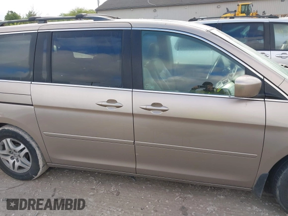 2006 Honda Odyssey EX-L z VIN 5FNRL38756B458936, wystawiony jako IAAI lot #42201902 z przebiegiem 339 976 mil mil oraz . Historia ofert i sprzedaży dostępna na DreamBid. Obrazek 13.