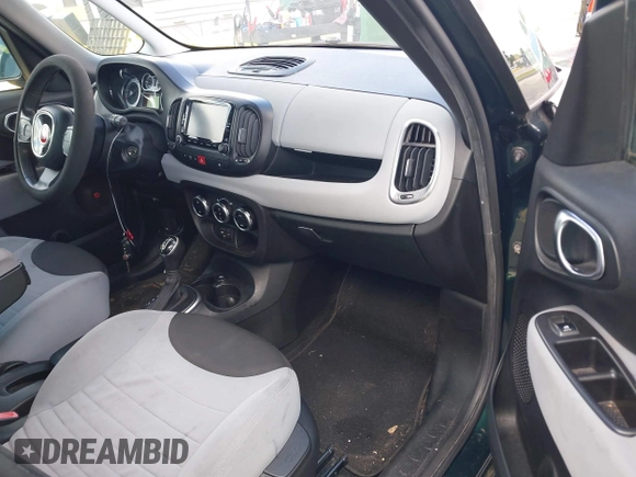 2014 FIAT 500L Easy with VIN ZFBCFABH0EZ014538, listed as a IAAI auction lot 42552809 with 97,225 mi miles and . Bid and sale history available at DreamBid. Image 5.