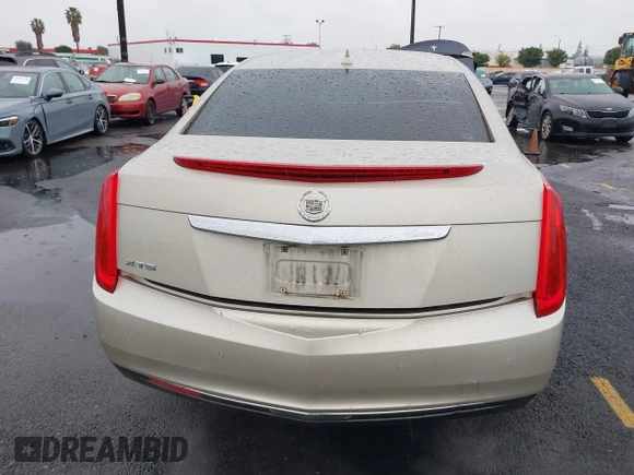 2013 Cadillac XTS z VIN 2G61N5S32D9127146, wystawiony jako IAAI lot #41578528 z przebiegiem 98 529 mil mil oraz . Historia ofert i sprzedaży dostępna na DreamBid. Obrazek 16.
