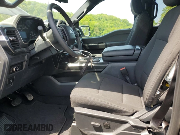2023 Ford F-150 with VIN 1FTFW1P83PKE89261, listed as a Copart auction lot 56625325 with 9,079 mi miles and Salvage title. Bid and sale history available at DreamBid. Image 7.