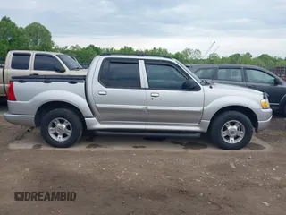 2004 Ford Explorer Sport Trac XLS z VIN 1FMDU77K74UA77223, wystawiony jako IAAI lot #42167996 z przebiegiem Nie podano mil oraz . Historia ofert i sprzedaży dostępna na DreamBid. Obrazek 13.