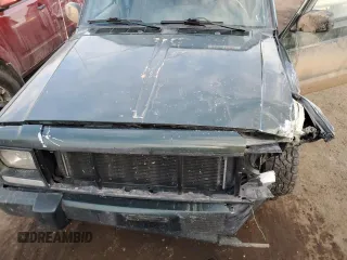 1997 Jeep Cherokee Country with VIN 1J4FJ78SXVL566804, listed as a Copart auction lot 88557395 with 216,230 mi miles and Salvage title. Bid and sale history available at DreamBid. Image 13.