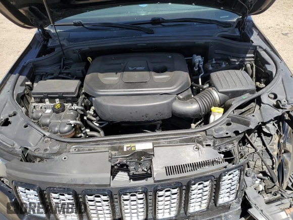 2019 Jeep Grand Cherokee Altitude with VIN 1C4RJEAG3KC533281, listed as a Copart auction lot 58298625 with 121,772 mi miles and Salvage title. Bid and sale history available at DreamBid. Image 12.