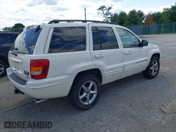 2002 Jeep Grand Cherokee Limited with VIN 1J8GW58J22C115460, listed as a IAAI auction lot 42291615 with 197,132 mi miles and . Bid and sale history available at DreamBid. Image 4.