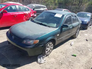2002 Mazda Protege DX with VIN JM1BJ225121601070, listed as a IAAI auction lot 41650083 with 169,662 mi miles. Bid and sale history available at carsss.com. Image 17.