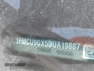 2013 Ford Escape SE z VIN 1FMCU9GX5DUA19887, wystawiony jako IAAI lot #42580986 z przebiegiem 169 407 mil mil oraz . Historia ofert i sprzedaży dostępna na DreamBid. Obrazek 9.