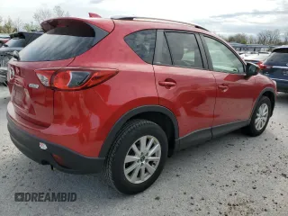 2014 Mazda CX-5 Touring with VIN JM3KE2CY6E0316041, listed as a Copart auction lot 52227835 with 69,921 mi miles and Salvage Title. Bid and sale history available at DreamBid. Image 3.