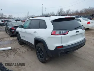 2022 Jeep Cherokee X with VIN 1C4PJMCX0ND537673, listed as a IAAI auction lot 41696191 with 22,063 mi miles. Bid and sale history available at carsss.com. Image 3.