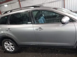 2011 Mazda CX-9 Touring with VIN JM3TB3CV6B0307358, listed as a IAAI auction lot 41979197 with 128,471 mi miles. Bid and sale history available at carsss.com. Image 13.