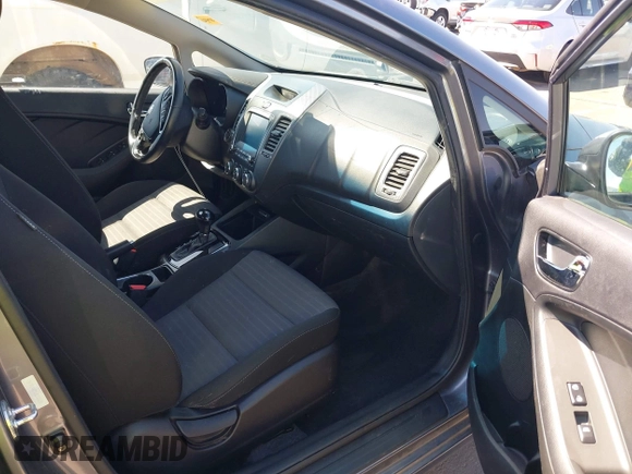 2018 Kia Forte LX with VIN 3KPFL4A77JE220538, listed as a IAAI auction lot 42095964 with 98,977 mi miles and . Bid and sale history available at DreamBid. Image 5.