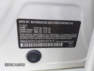 2013 BMW 5 Series 528i xDrive with VIN WBAXH5C54DD107317, listed as a IAAI auction lot 42244446 with 47,858 mi miles and . Bid and sale history available at DreamBid. Image 9.