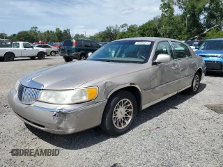 2001 Lincoln Town Car Signature z VIN 1LNHM82W51Y645541, wystawiony jako Copart lot #63058515 z przebiegiem 181 532 mil mil oraz Czysty tytuł • Clean title. Historia ofert i sprzedaży dostępna na DreamBid. Obrazek 1.