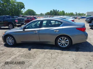 2015 Infiniti Q50 with VIN JN1BV7AP0FM357018, listed as a IAAI auction lot 42326677 with 179,436 mi miles and . Bid and sale history available at DreamBid. Image 14.