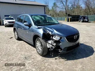 2015 Mazda CX-5 Sport with VIN JM3KE4BY9F0552942, listed as a Copart auction lot 54750245 with 129,700 mi miles and Salvage title. Bid and sale history available at DreamBid. Image 14.