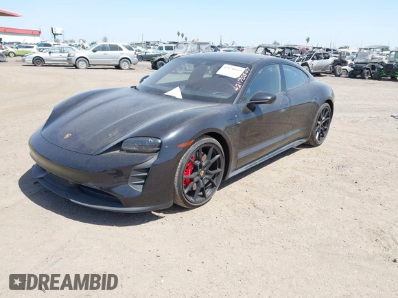2022 Porsche Taycan GTS z VIN WP0AD2Y12NSA59275, wystawiony jako IAAI lot #42170547 z przebiegiem 43 757 mil mil oraz . Historia ofert i sprzedaży dostępna na DreamBid. Obrazek 19.