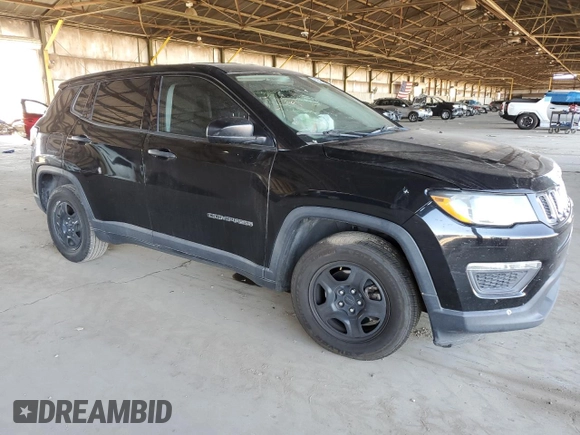 2018 Jeep Compass Sport with VIN 3C4NJCAB7JT369169, listed as a Copart auction lot 62609335 with 148,398 mi miles and Salvage title. Bid and sale history available at DreamBid. Image 4.