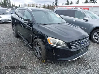 2014 Volvo XC60 R-Design Premier Plus z VIN YV4902DZ7E2553989, wystawiony jako IAAI lot #41919724 z przebiegiem 145 952 mil mil oraz . Historia ofert i sprzedaży dostępna na DreamBid. Obrazek 1.