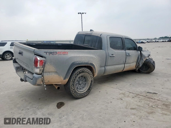 2021 Toyota Tacoma SR5 with VIN 3TMDZ5BN4MM105639, listed as a Copart auction lot 56948395 with Not provided miles and Salvage title. Bid and sale history available at DreamBid. Image 3.