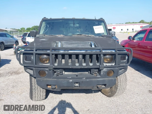 2003 Hummer H2 z VIN 5GRGN23UX3H140510, wystawiony jako IAAI lot #42325527 z przebiegiem 140 010 mil mil oraz . Historia ofert i sprzedaży dostępna na DreamBid. Obrazek 13.