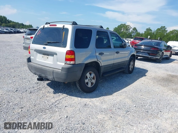 2007 Ford Escape XLS with VIN 1FMYU02Z87KA02382, listed as a IAAI auction lot 42683581 with 309,851 mi miles and . Bid and sale history available at DreamBid. Image 4.