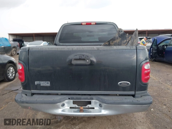 2003 Ford F-150 XLT with VIN 1FTRW07623KD67409, listed as a IAAI auction lot 41912067 with Not Provided miles. Bid and sale history available at carsss.com. Image 16.