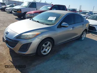 2011 Mazda 3 i Sport with VIN JM1BL1UF4B1434455, listed as a IAAI auction lot 42195864 with 127,556 mi miles and . Bid and sale history available at DreamBid. Image 2.