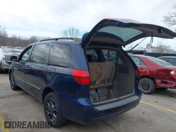 2005 Toyota Sienna LE with VIN 5TDBA23C25S048997, listed as a IAAI auction lot 41883065 with 245,085 mi miles. Bid and sale history available at carsss.com. Image 3.