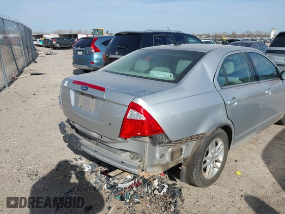 2012 Ford Fusion S with VIN 3FAHP0GA2CR143572, listed as a IAAI auction lot 41826526 with 199,083 mi miles. Bid and sale history available at carsss.com. Image 6.