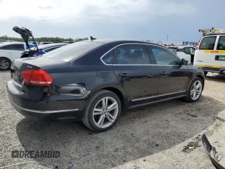 2014 Volkswagen Passat SE with VIN 1VWBN7A35EC094262, listed as a Copart auction lot 60287965 with 71,081 mi miles and Salvage title. Bid and sale history available at DreamBid. Image 3.