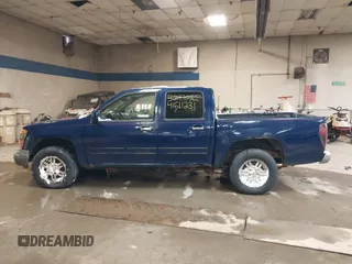 2011 GMC Canyon SLE1 with VIN 1GTH6MFE3B8123808, listed as a IAAI auction lot 41611231 with 142,877 mi miles. Bid and sale history available at carsss.com. Image 14.