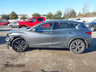 2018 Infiniti QX30 Premium with VIN SJKCH5CR5JA055906, listed as a IAAI auction lot 41336852 with 106,808 mi miles and . Bid and sale history available at DreamBid. Image 14.