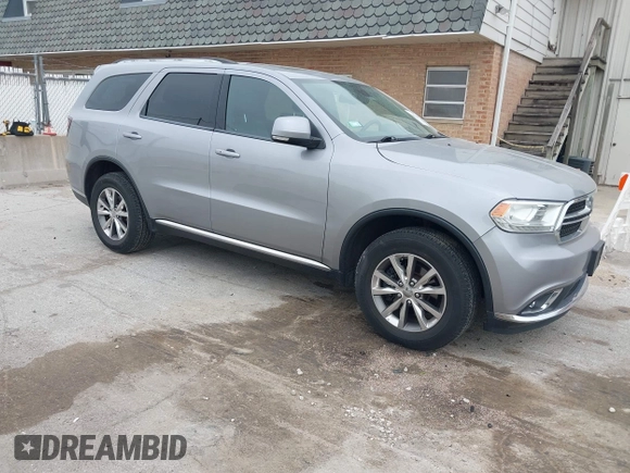2014 Dodge Durango Limited z VIN 1C4RDJDG2EC976361, wystawiony jako IAAI lot #42151560 z przebiegiem 151 522 mil mil oraz . Historia ofert i sprzedaży dostępna na DreamBid. Obrazek 1.
