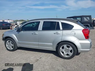 2009 Dodge Caliber SXT with VIN 1B3HB48A39D142674, listed as a IAAI auction lot 41642867 with 156,504 mi miles and . Bid and sale history available at carsss.com. Image 15.