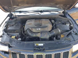 2015 Jeep Grand Cherokee Overland with VIN 1C4RJECG3FC635327, listed as a IAAI auction lot 41910559 with 118,519 mi miles and . Bid and sale history available at DreamBid. Image 10.
