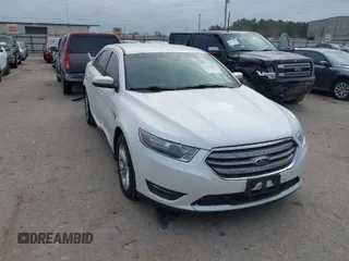 2013 Ford Taurus SEL with VIN 1FAHP2E87DG111530, listed as a IAAI auction lot 41322957 with 183,103 mi miles. Bid and sale history available at carsss.com. Image 1.