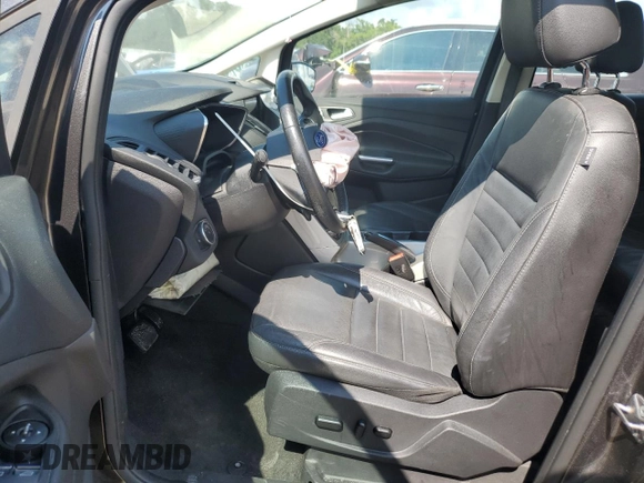 2016 Ford C-Max Energi SEL with VIN 1FADP5CU0GL101658, listed as a Copart auction lot 68214393 with 66,390 mi miles. Bid and sale history available at carsss.com. Image 7.