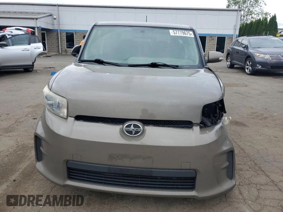 2012 Scion xB z VIN JTLZE4FE1CJ014494, wystawiony jako Copart lot #57779675 z przebiegiem 151 857 mil mil oraz Szkody całkowita. Historia ofert i sprzedaży dostępna na DreamBid. Obrazek 5.