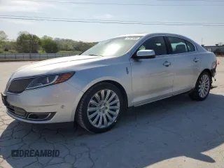 2013 Lincoln MKS z VIN 1LNHL9EK0DG612314, wystawiony jako Copart lot #52901685 z przebiegiem 124 828 mil mil oraz Szkoda całkowita • Salvage title. Historia ofert i sprzedaży dostępna na DreamBid. Obrazek 1.
