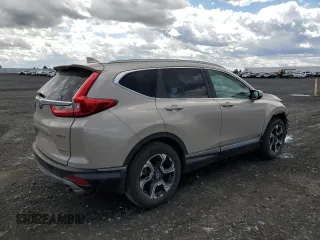 2018 Honda CR-V Touring with VIN 5J6RW2H98JL002657, listed as a Copart auction lot 55075965 with 61,327 mi miles and Salvage Title. Bid and sale history available at DreamBid. Image 3.