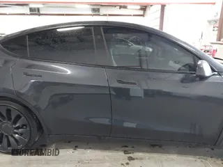 2024 Tesla Model Y Performance with VIN 7SAYGDEFXRF049338, listed as a IAAI auction lot 41240812 with 10,132 mi miles and . Bid and sale history available at DreamBid. Image 13.