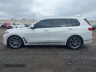 2019 BMW X7 xDrive40i z VIN 5UXCW2C53KL083874, wystawiony jako IAAI lot #41280522 z przebiegiem 155 067 mil mil oraz . Historia ofert i sprzedaży dostępna na DreamBid. Obrazek 13.