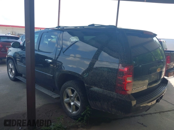 2008 Chevrolet Suburban LTZ with VIN 1GNFK16328R161721, listed as a IAAI auction lot 42130017 with 242,266 mi miles. Bid and sale history available at carsss.com. Image 3.