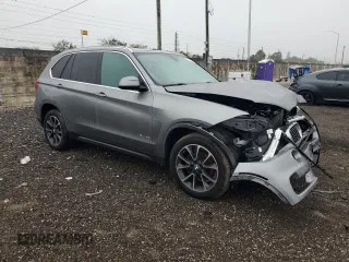 2017 BMW X5 sDrive35i with VIN 5UXKR2C36H0X04777, listed as a Copart auction lot 87718635 with 0 mi miles and Salvage Title. Bid and sale history available at carsss.com. Image 4.