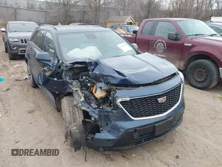 2020 Cadillac XT4 AWD Sport with VIN 1GYFZFR48LF101467, listed as a IAAI auction lot 41113381 with 72,841 mi miles and . Bid and sale history available at DreamBid. Image 6.