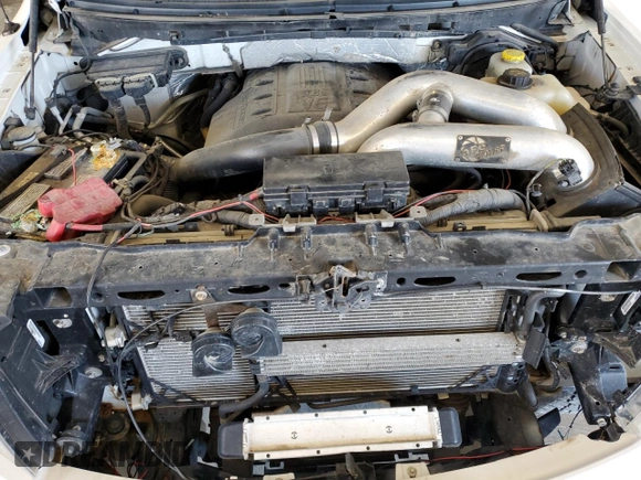 2014 Ford F-150 XL with VIN 1FTFW1ETXEFB39719, listed as a Copart auction lot 62073335 with 124,643 mi miles and Salvage title. Bid and sale history available at DreamBid. Image 11.