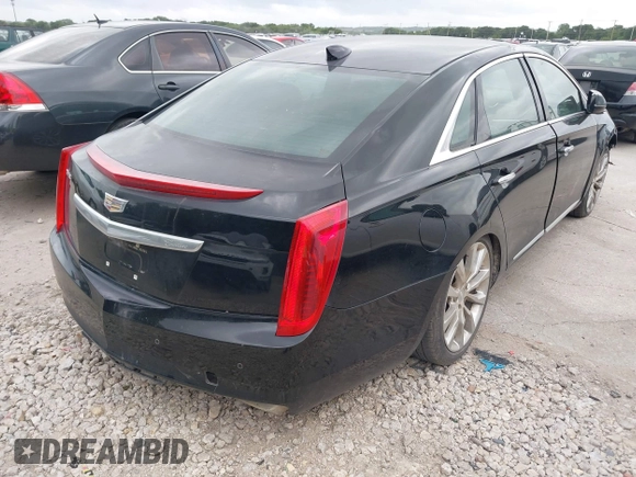 2017 Cadillac XTS Luxury z VIN 2G61M5S32H9158776, wystawiony jako IAAI lot #42528442 z przebiegiem 90 680 mil mil oraz . Historia ofert i sprzedaży dostępna na DreamBid. Obrazek 4.