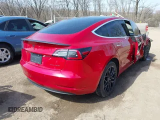2020 Tesla Model 3 Long Range with VIN 5YJ3E1EB9LF666066, listed as a IAAI auction lot 41759976 with 69,323 mi miles. Bid and sale history available at carsss.com. Image 4.